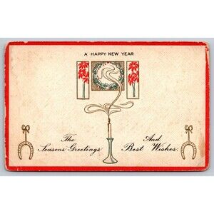 Postcard Happy New Year Candle Horseshoes Seasons Greetings Embossed Posted 1916